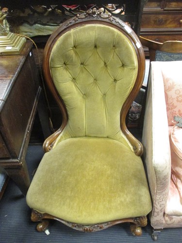 Lot 363 - A Victorian button upholstered open arm easy...