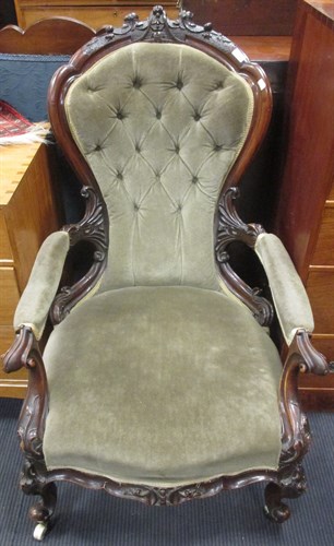 Lot 404 - A Victorian button upholstered open arm easy...