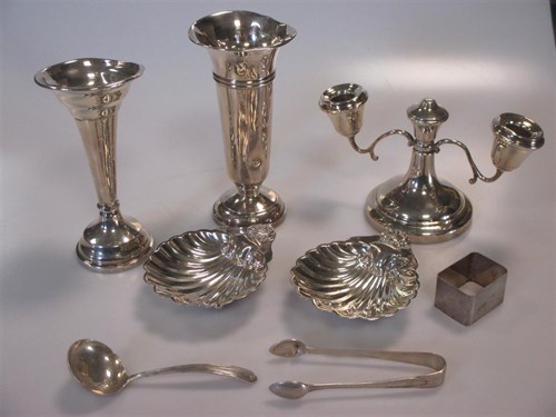Lot 137 - A collection of silver to include a pair of...