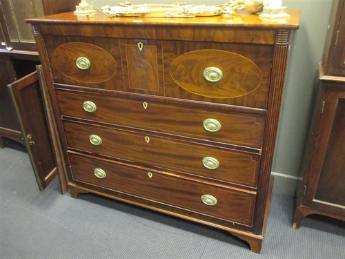 Lot 311 - A Georgian mahogany secretaire chest with line...