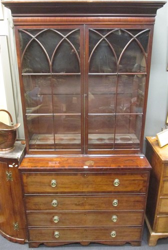 Lot 329 - A George III mahogany secretaire bookcase, the...