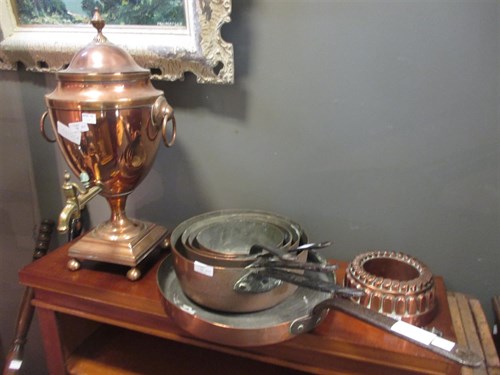 Lot 75 - A set of five graduated copper and iron...