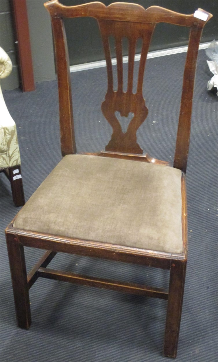 Lot 371 - A set of four county Chippendale style chairs...