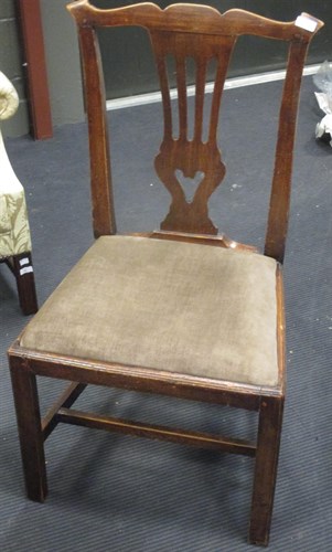 Lot 371 - A set of four county Chippendale style chairs...