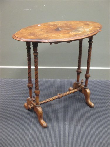 Lot 364 - A Victorian walnut oval table on turned legs...