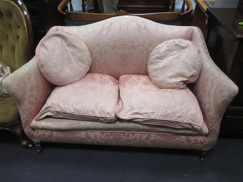 Lot 373 - An Edwardian sofa upholstered in a pink damask...