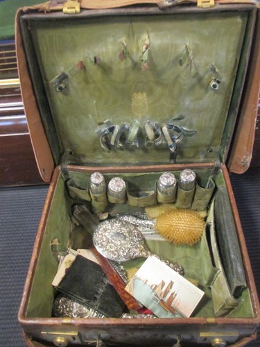 Lot 158 - A lady's leather travelling vanity case...
