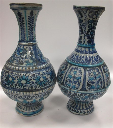 Lot 53 - Two similar blue and white tin glaze vases in...