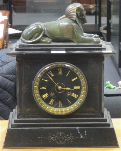Lot 70 - A 19th century black marble mantle clock...