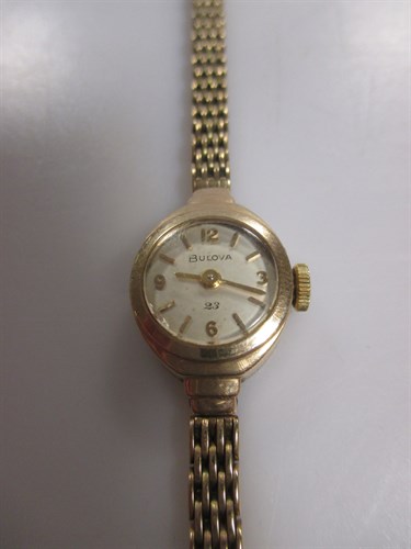 Lot 166 - A Lady's 9ct gold 'Bulova' wristwatch with...