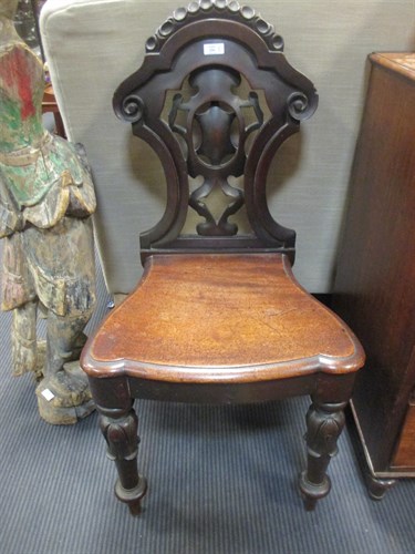 Lot 353 - A pair of mid Victorian mahogany hall chairs (2)