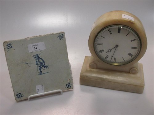 Lot 54 - A Delft tile, an alabaster mantle clock and...