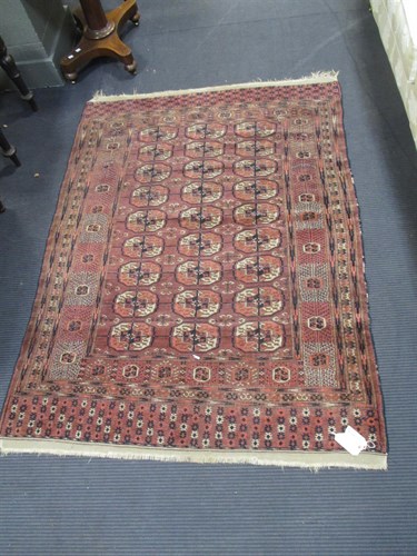 Lot 436 - A red ground tekke, 170 x 120cm