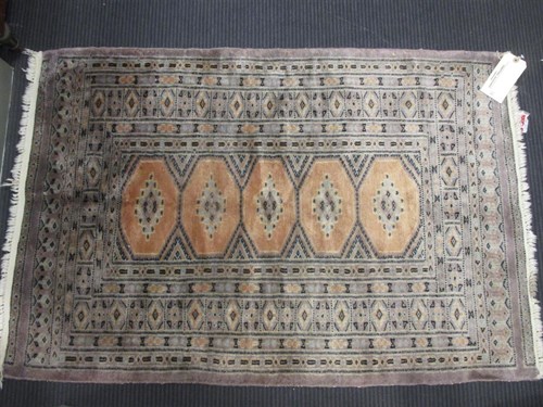 Lot 441 - A lilac ground rug, 124 x 81cm