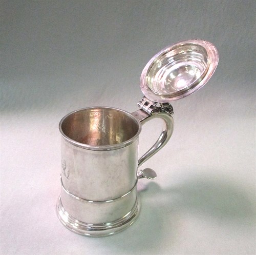 Lot 33 - A George I Britannia silver lidded tankard