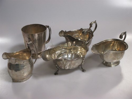 Lot 232 - A Britannia silver cream jug, together with...