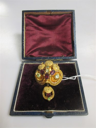 Lot 173 - A Victorian gilt metal stone set brooch, in a...