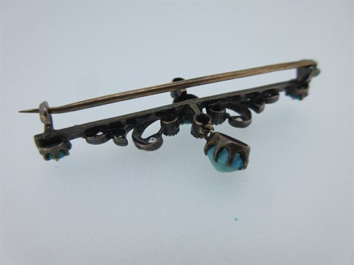 Lot 301 - A turquoise and diamond bar brooch