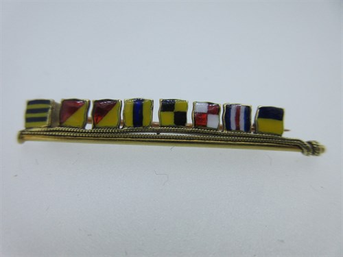 Lot 240 - An enamel signal flag brooch in the style of Benzie