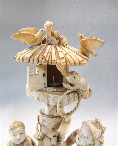 Lot 188 - A late 19th century Japanese carved ivory  figure group