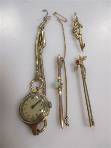 Lot 175 - A trio of bar brooches each stamped '9ct' and...