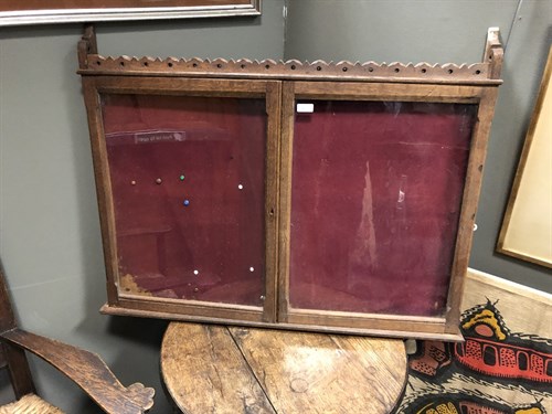 Lot 87 - A 19th century Gothic style glazed oak notice board