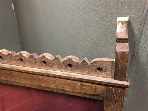 Lot 87 - A 19th century Gothic style glazed oak notice board