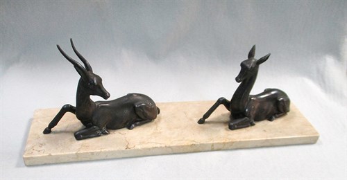 Lot 15 - A pair of Art Deco bronzed spelter gazelles