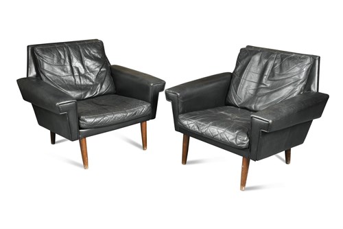 Lot 147 - A pair of 1960's Danish design black leather lounge chairs