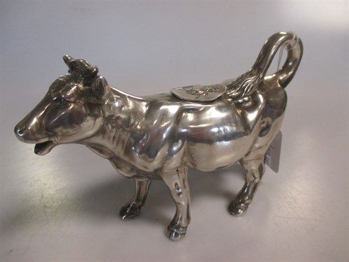 Lot 226 - A German metalwares silver naturalistic cow creamer