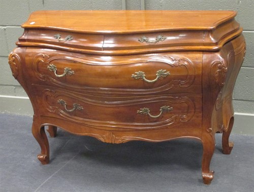 Lot 354 - A Continental bombe commode, of serpentine...