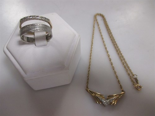 Lot 177 - A 9ct gold pendant and chain set with diamonds...