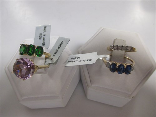 Lot 184 - A 9ct blue and white stone dress ring, a...