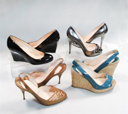 Lot 59 - A pair of Christian Louboutin bronze faux snakeskin sling-back stiletto heels
