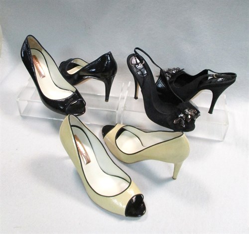 Lot 60 - A pair of Dolce & Gabbana black fabric sling-back stilettos