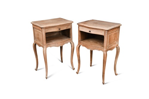Lot 415 - A pair of French Provincial bleached-oak bedside tables