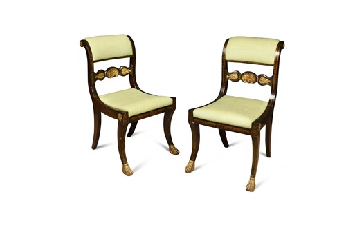 Lot 361 - A pair of Regency parcel gilt faux rosewood dining chairs