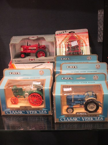 Lot 31 - ERTL; Three 5607 John Deere overtime, boxed,...