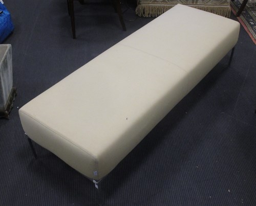 Lot 403 - A modern upholstered footstool by B and B...
