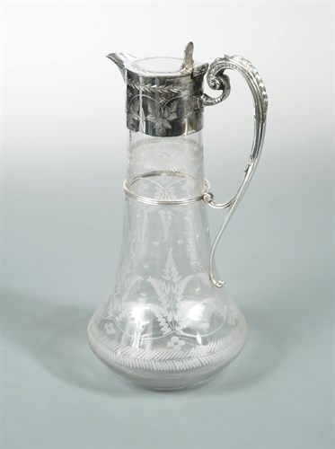 Lot 2 - A late Victorian silver plated claret jug