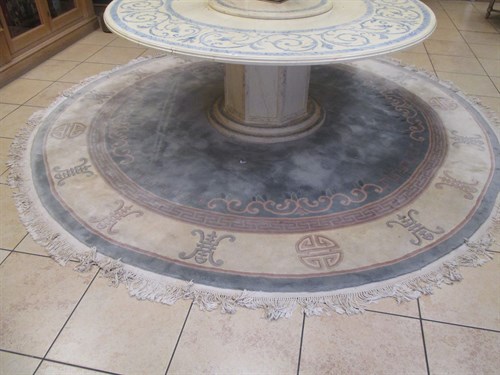 Lot 542 - A large modern circular Chinese rug, 318cm...