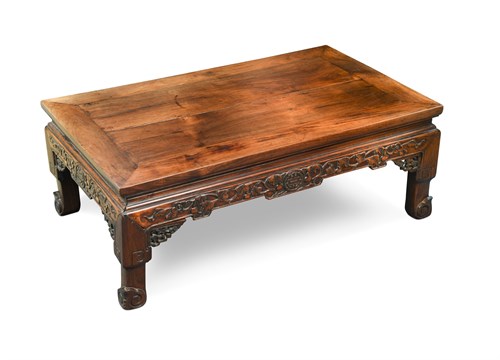 Lot 200 - A Chinese carved hardwood opium table