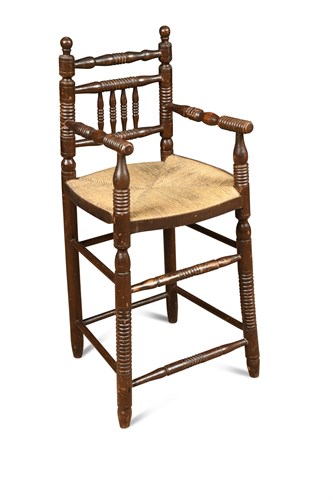 Lot 371 - An early 19th century painted rush seat correction chair