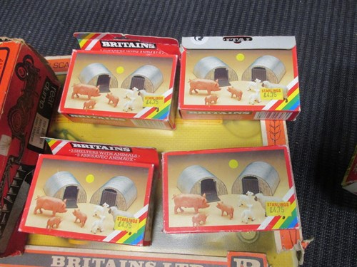 Lot 17 - Britains; A 9592 Farm Tractor and implement...