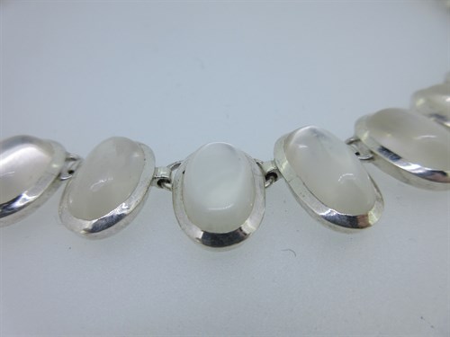Lot 303 - A modern silver necklace set with moonstones