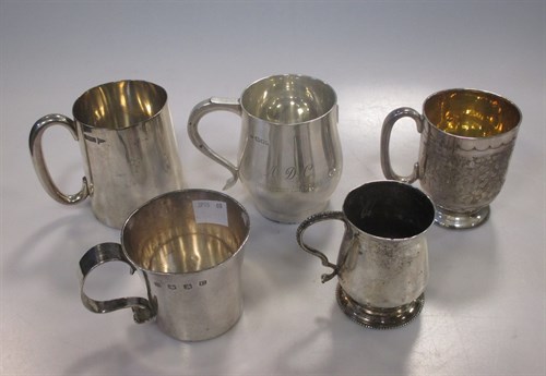 Lot 222 - Five various silver christening and other mugs,...