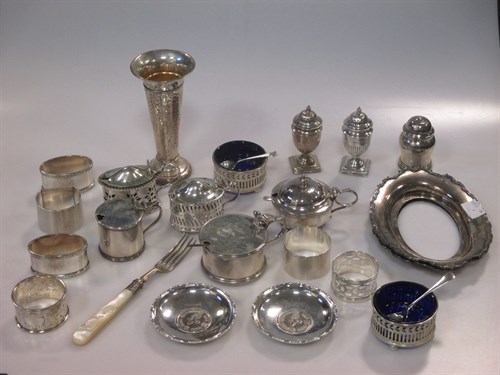 Lot 211 - A quantity of silver mustards, napkin rings...