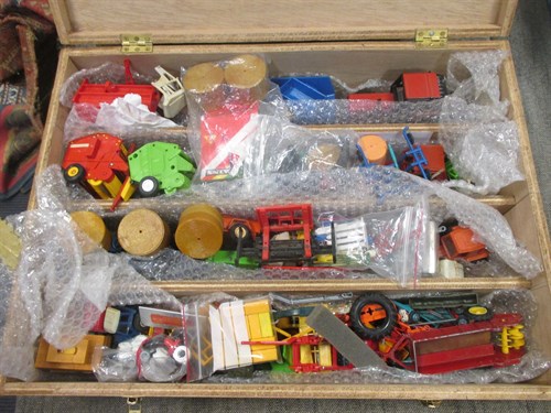 Lot 44 - Britains; unboxed plastic and die-cast tractor...