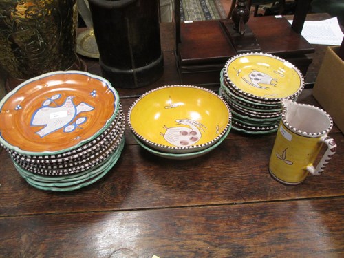 Lot 136 - An Italian pottery dinner service, painted to...