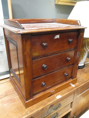 Lot 377 - A mid-Victorian tabletop Wellington chest with...